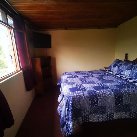 La Tranquilidad Hostel Mindo Bagian luar foto