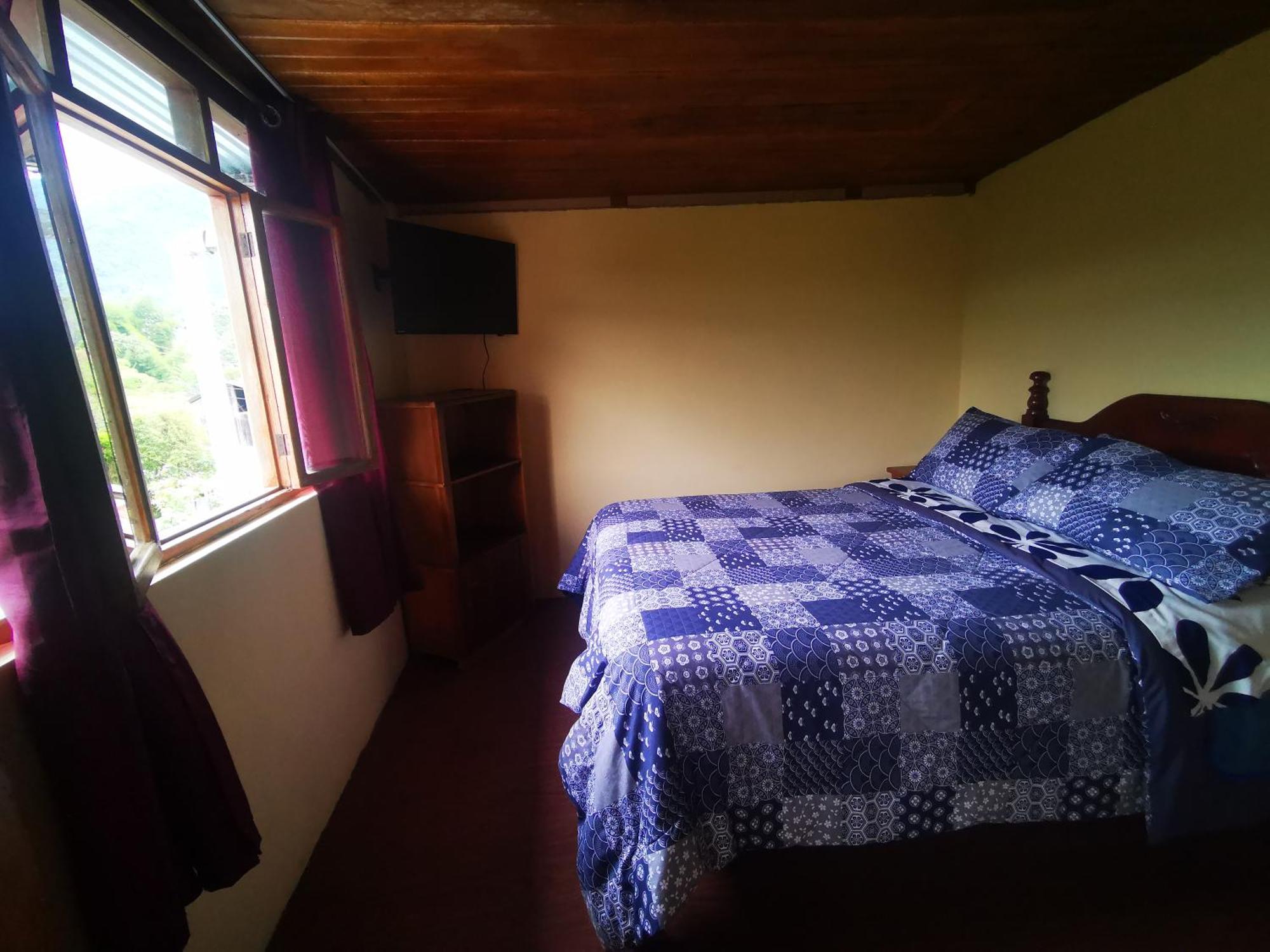 La Tranquilidad Hostel Mindo Bagian luar foto